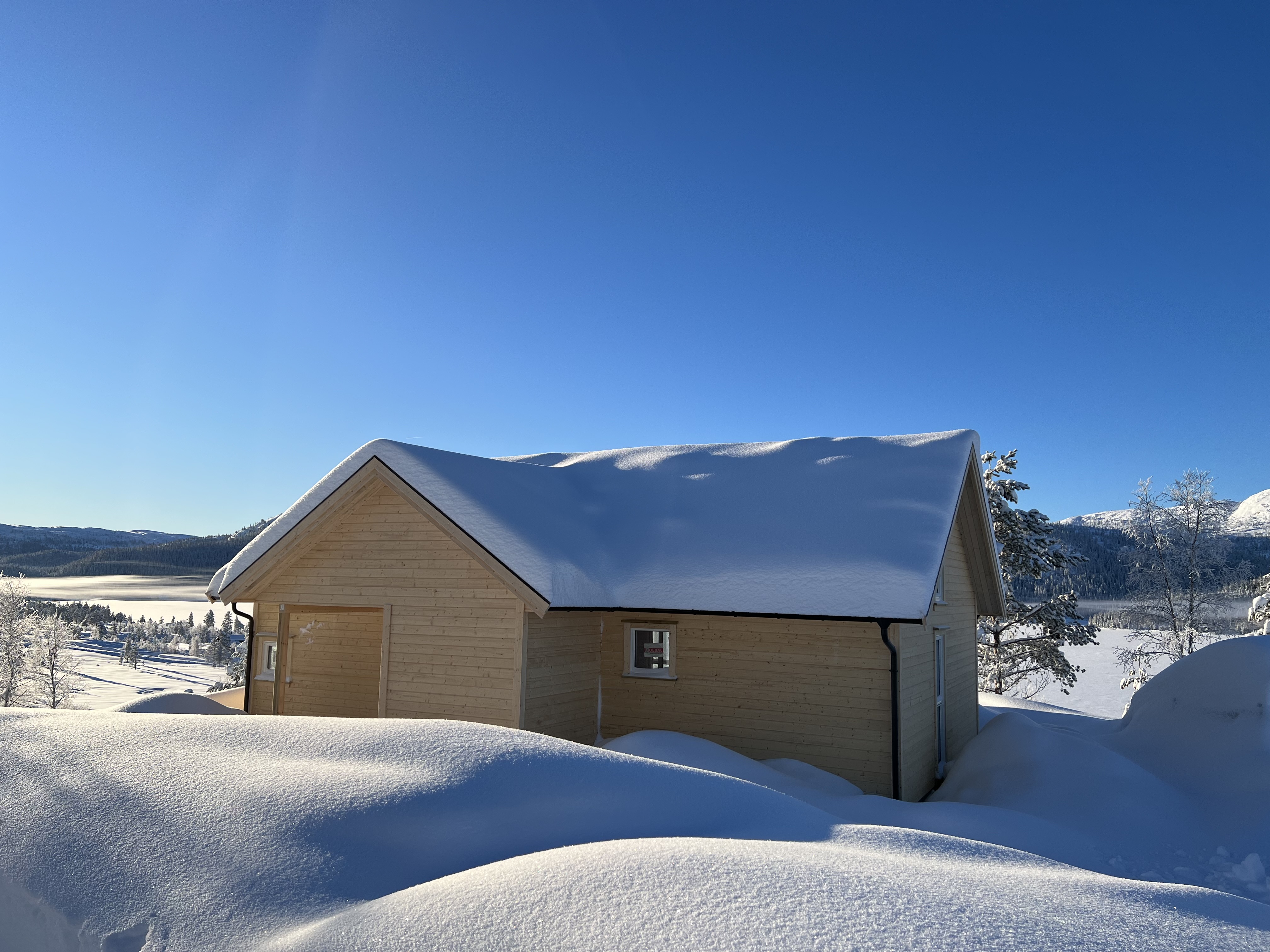 Hyttetomter i Birtedalen i Fyresdal kommune på vinter